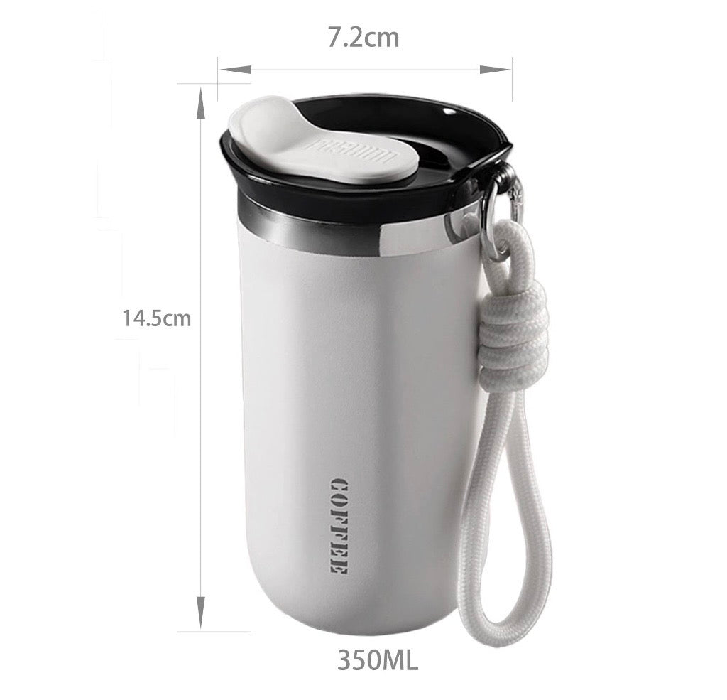 A stainless steel coffee cup with a black lid, white straw, and white carrying cord, shown with dimension labels: 7.2cm width, 14.