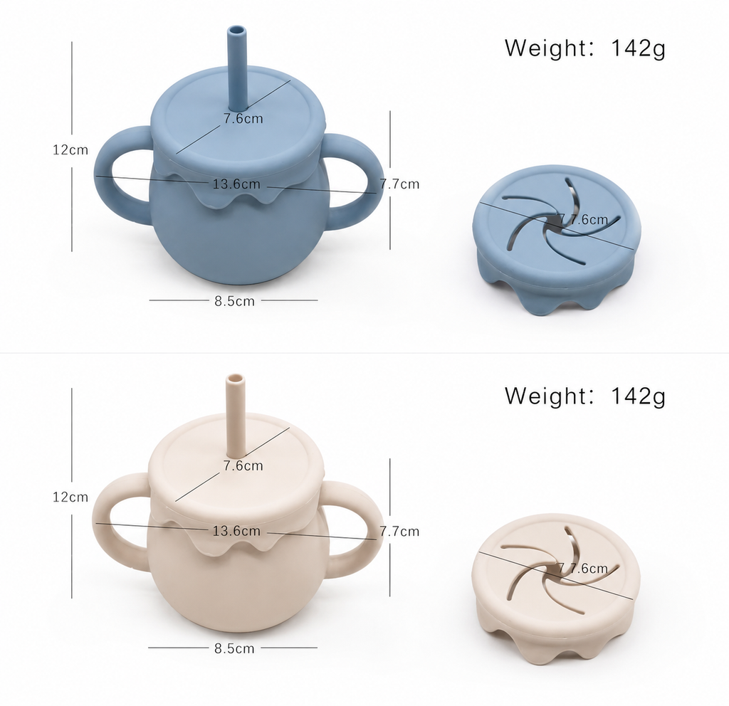 Two silicone baby feeding cups shown with dimension lines and weight text on a white background. The top cup is dusty blue and the bottom cup is warm beige, both with handles, a spout, and a small round lid shown beside each main cup.